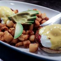 Eggs Benedict · Poached, canadian bacon, hollandaise, english muffin, mixed greens.
