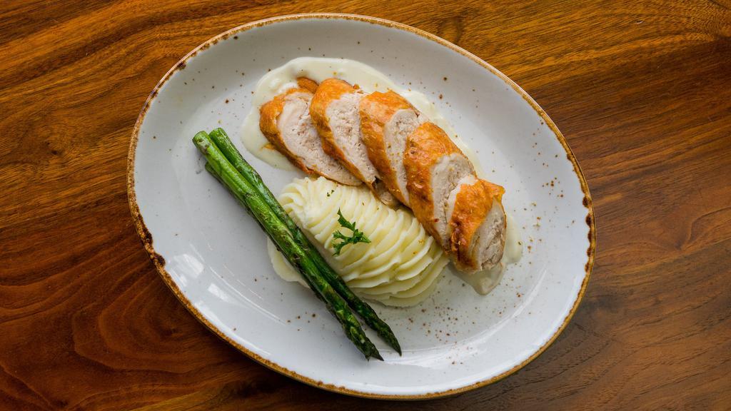 Chicken Roulade  · Golden fried breast stuffed with tarragon shallot sausage | Grilled Asparagus | Truffle Whipped Potatoes | Tarragon cream gravy