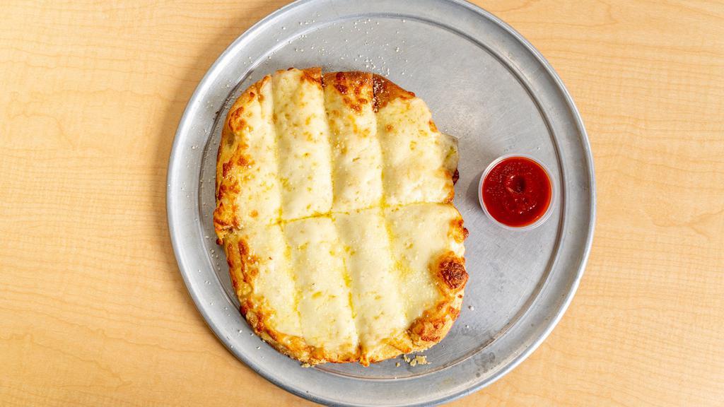 Cheese Bread · A cross between garlic bread and pizza, cheesy bread is a quick, easy and delicious party snack.