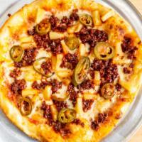 Carne Asada Pizza · Steak, chipotle sauce, mozzarella cheese, onion, cilantro and asada meat.