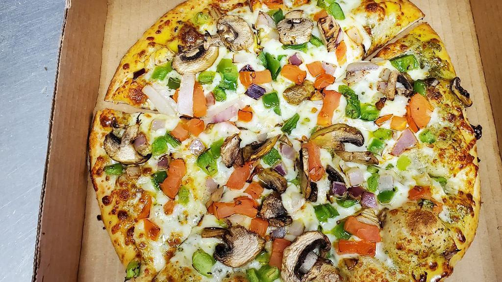 Veggie Pizza · Vegetarian. Olive oil, spinach, mozzarella cheese, tomato, onion and mushrooms.