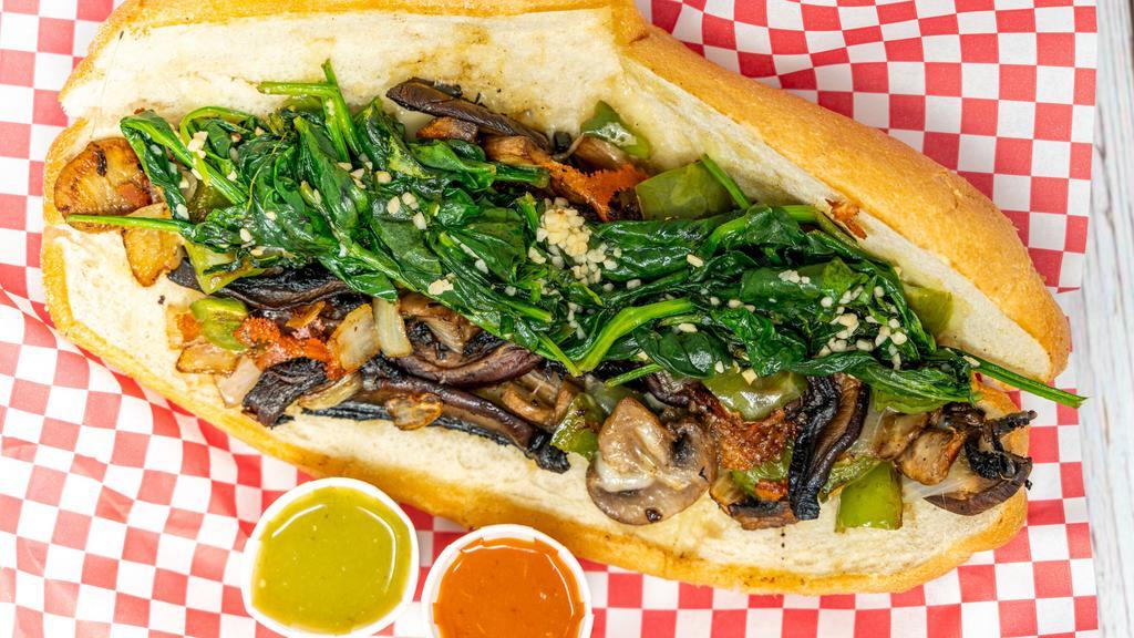 Veggie Primo Sub · Vegetarian. Grilled onion, green peppers, whole roasted portabella mushrooms, spinach, olive oil, garlic and choice of cheese.