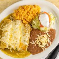 Carne Asada · Tender skirt steak grilled to your preference. Served with rice, beans, salad and tortillas.