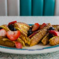 French Toast · With two bacon strips or sausage links.