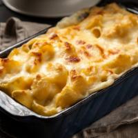 Baked Mac & Cheese · Fresh baked cheesy macaroni.