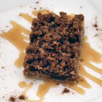 Caramel Apple Pie Bar · A buttery shortbread crust, cinnamon apples with streusel topping and silky caramel.