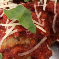 World Famous Meatballs (1/2 Lb) · 5 Meatballs served With Sunday gravy, parmesan, basil and Homemade Focaccia.