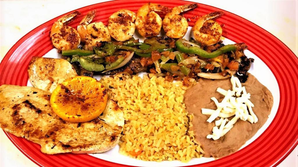 El Presidente (Stk, Shrimp &Chkn  · Grilled juicy skirt Steak, seasoned chicken breast and 6 Jumbo shrimps in garlic sauce.  served with rice, beans, Cebollitas Mexicanas, chile toreado lettuce and tomatoes. side of tortillas.