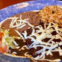Mole Chicken Enchilada Dnr · 3 Rolled tortillas in mole sauce, stuffed with chihuahua cheese to perfection, beans, rice, ...