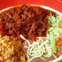 Lomo D Res En Chile D Arbol · Sliced RIB EYE IN VERY SPICY RED SAUCE, served with rice beans lettuce tomatoes and tortillas.