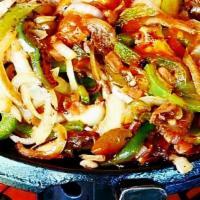 Chicken Fajitas  · CHICKEN BREAST  green pepper onions and tomatoes grilled and deliciously served in a flamed ...