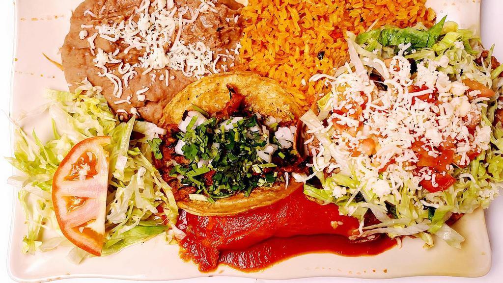 #12 Combination(Taco, Tost, Ench)  · Includes ONE TACO, ONE TOSTADA, ONE cheese ENCHILADA regular suiza. side of rice and beans