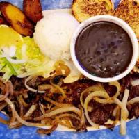 Bistec A La Cubana · Deliciously seasoned Steak with grilled onions, Cuban seasoning  style, served with side of ...