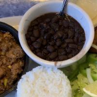 Picadillo Cuban Style · Ground beef, onions, olives and green peppers, seasoned in our cuban sauce, white rice, blac...