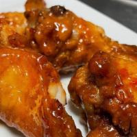 Ck Wings - Chili · Our lightly breaded house fried chicken wings with Sweet Chili sauce.  (Qty 7)