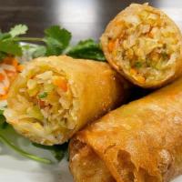 Vegetarian Eggrolls · Crispy rice paper filled with mung beans, cabbage, carrots, onions, vermicelli, herbs & spic...