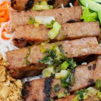 Bun Nem Nuong · Pork Sausage with rice noodles, lettuce, cucumbers, bean sprouts, pickled carrots/daikon.  T...