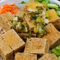 Bun Tofu · Fried Tofu with rice noodles, lettuce, cucumbers, bean sprouts, pickled carrots/daikon. Topp...