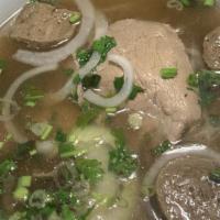 Pho Tai & Bo Vien · Pho w/ Lean beef & meatballs.  NOTE: For takeout, the lean beef is thinly sliced and served ...