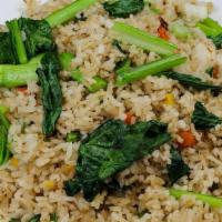 Tofu Fried Rice · Fried rice with chinese greens (Yu Chow), carrots, peas, onions & eggs