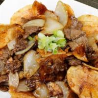 Beef & Potatoes · Beef & crispy potatoes stir fry with onions in chef's special sauce.