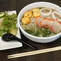Hu Tiu My Tho · Rice noodles in a light and flavorful broth. Includes shrimp, squid & sliced pork, green oni...