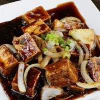 Hot & Spicy Tofu · Fried Tofu stir fry with lemongrass & onions in chef's special sauce.