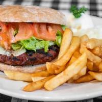 Gurmanska Pljeskavica · Our specialty gourmet Serbian burger stuffed with cheese and bacon and just the right amount...