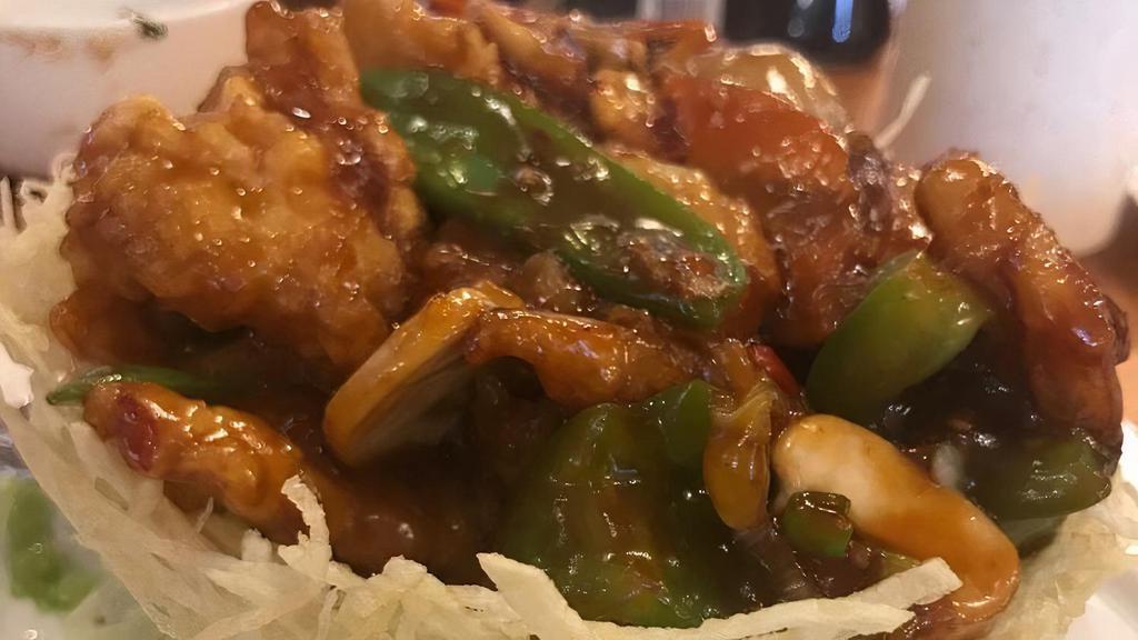 Ocean Basket · Jumbo shrimp, scallop, & flounder stir fry with Red & green pepper, carrots, mushroom, & Snow pea in a spicy garlic sauce.
