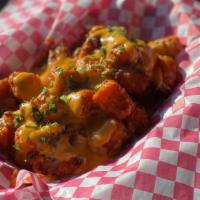 Loaded Tots · Tator Tots, Chili, Cheese Blend, and Chives. Served w/ Sour Cream.