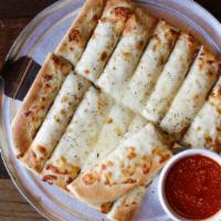 Cheese Breadsticks · Our breadsticks topped with Mozzarella cheese. Served with Marinara.