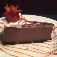 *Triple Chocolate Cheesecake · Our creamy decadent cheesecake is amazing.