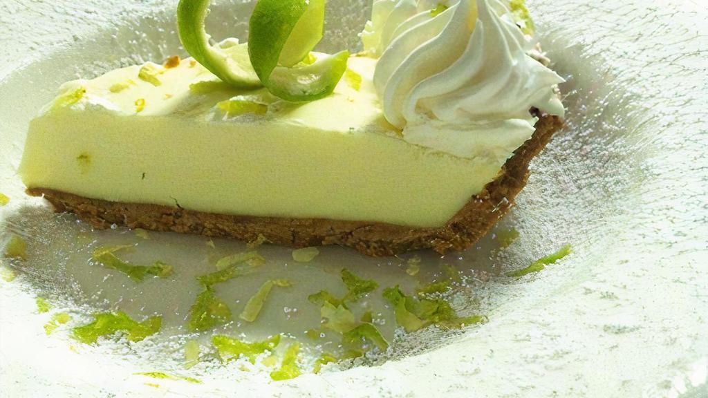 *Key Lime Pie · Florida key lime pie with a graham cracker crust and topped with whipped cream.