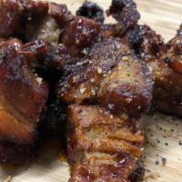 Burnt Ends  · Smoked pork belly drizzled in BBQ sauce. 

Frankie smokes the pork belly for a long 11 hours...