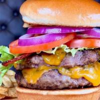 Bacon Cheeseburger Combo · Bacon cheeseburger with bacon, American cheese, lettuce, tomato, red onion, and pickles. Ser...