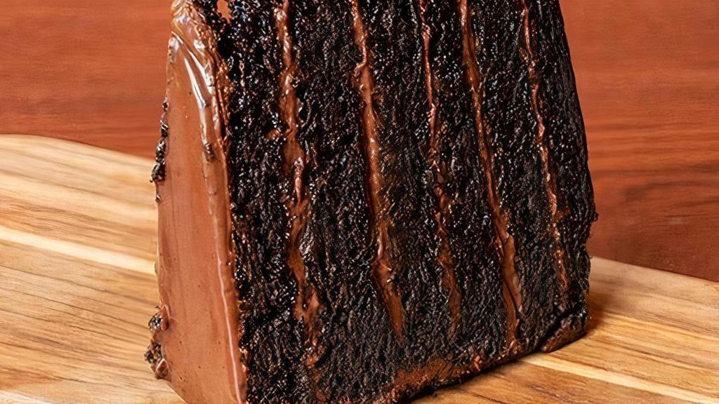 Chocolate Cake · Five layers of chocolate cake, dark fudge, sweet chocolate frosting, vanilla ice cream, a chocolate drizzle.