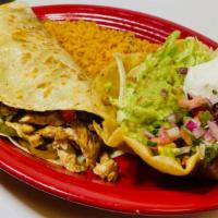 Casa Fajita Quesadilla · A large tortilla stuffed with cheese, chicken, steak and shrimp. Grilled with green peppers,...
