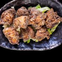 Chicken Karaage · (10) Pieces of Japanese-style Marinated Chicken deep-fried in Potato Starch.