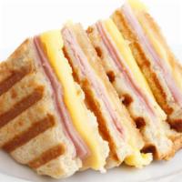Panini With Ham And Cheese · Classic panini filled with fresh ham and melty cheese.