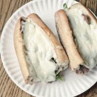 Extra Cheesy Cheesesteak · Our cheesesteak sandwich topped with extra provolone cheese.