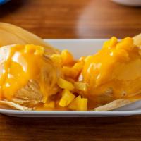 Tamal De Mango · sweet corn masa stuffed with chipotle cream goat cheese & mango sauce