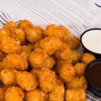 Potato Tots · Gluten free. Served with ranch dressing for dipping.