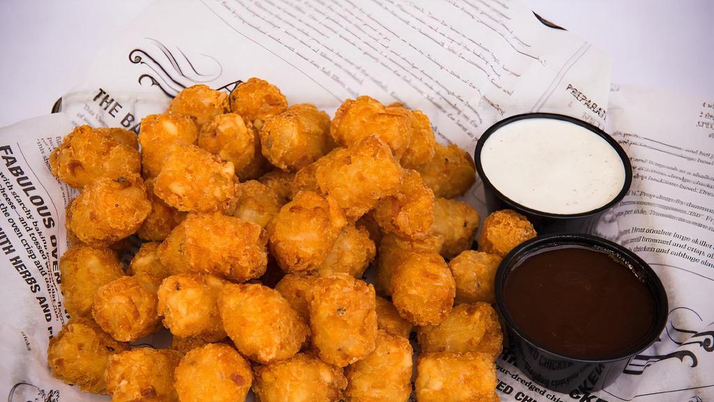 Potato Tots · Gluten free. Served with ranch dressing for dipping.