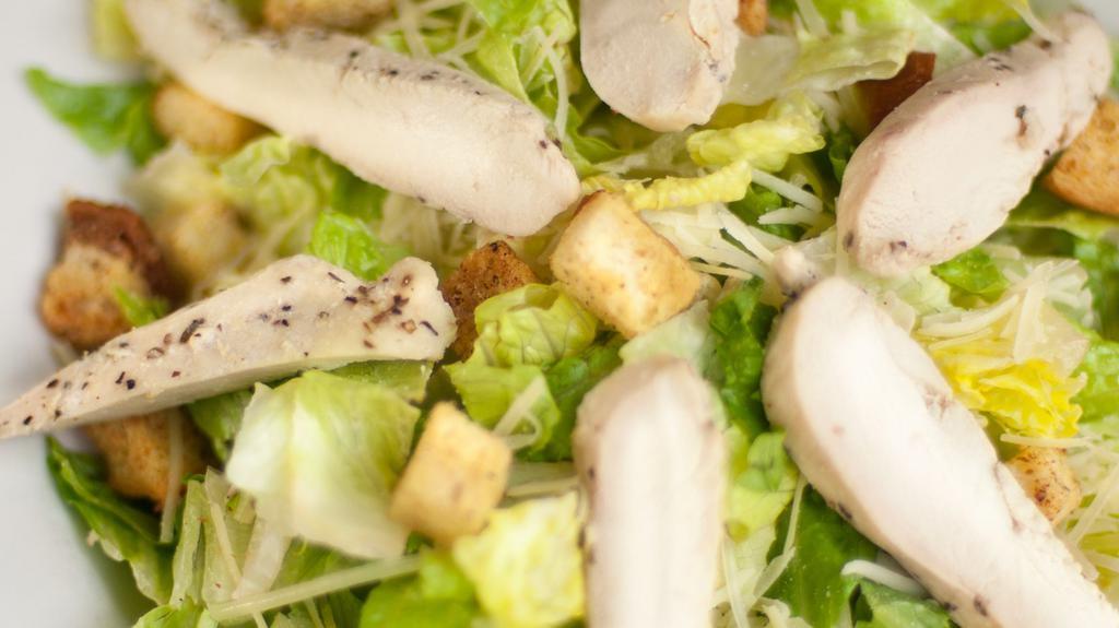 Caesar Salad · Romaine lettuce, homemade Caesar dressing, Parmesan & garlic croutons. Add chicken for an additional charge.