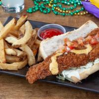 Fried Fish Po'Boy · creole seasoned, crispy fried white bass fillet, served with remoulade, tomato-onion relish,...