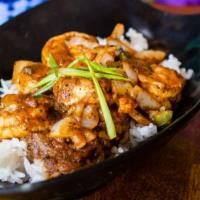 N'Awlins Bbq Shrimp · Sautéed in lemon garlic butter over rice