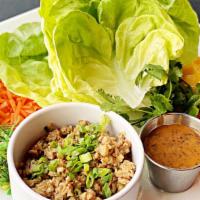Asian Lettuce Wraps (Gluten Friendly) · Hoisin garlic ginger chicken, butter lettuce wraps, pickled carrots, ginger, avocado, mango,...