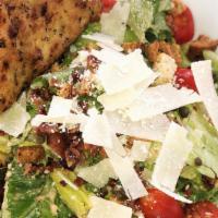 Caesar Salad · Chopped romaine lettuce, grape tomatoes, shaved Parmesan, house croutons, hickory smoked bac...