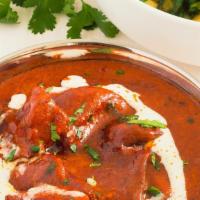 Chicken Tikka Masala · Bestseller. Boneless chicken pieces grilled in tandoor and sautéed with tomato sauce. Served...