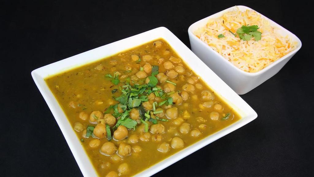Chana Masala (Chick Peas) · Comes With Side Of Rice. Serves 2 People.